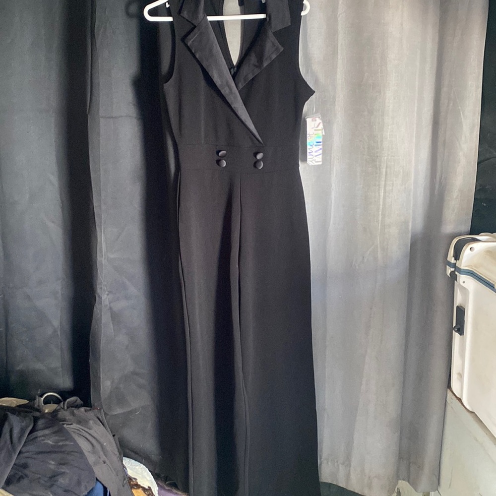 NEW WITH TAGS. ALMOST FAMOUS. STRETCH JUMPSUIT